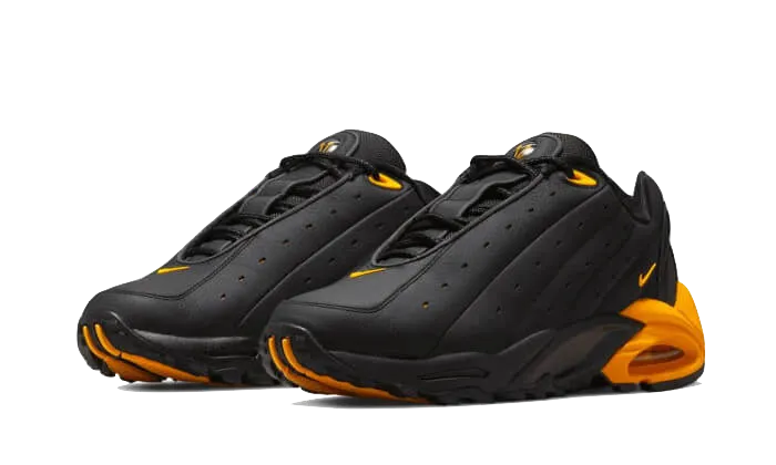 NOCTA Hot Step Air Terra Black University Gold